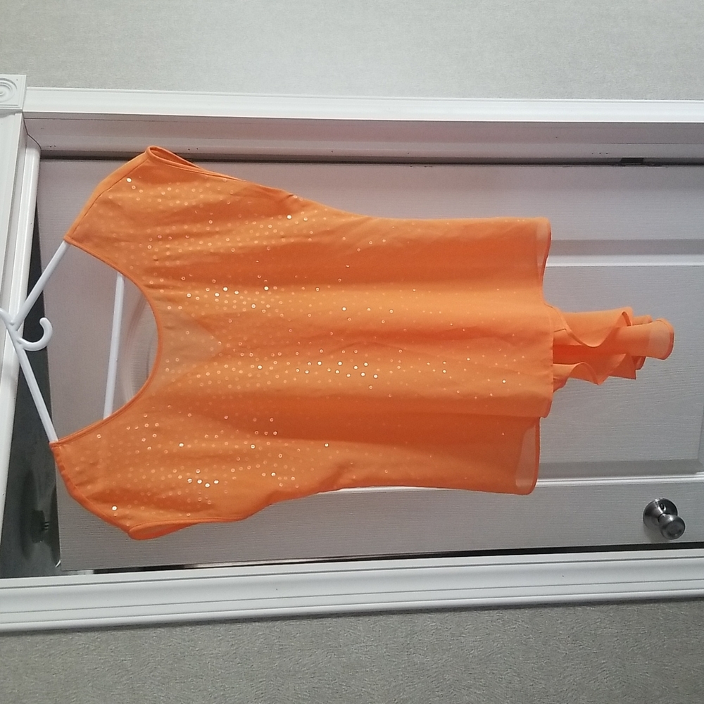 Studio Y orange blouse with sequins and a longer flowy back detail. Very pretty